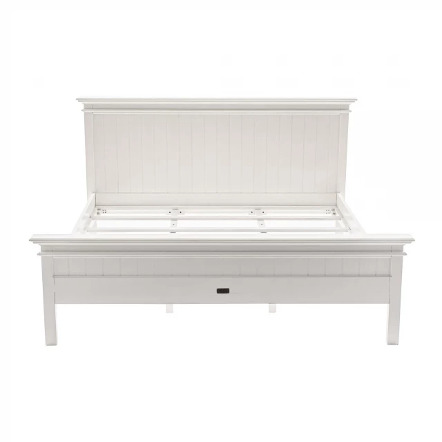 Classic white panel king bed in a minimalist bedroom setting
