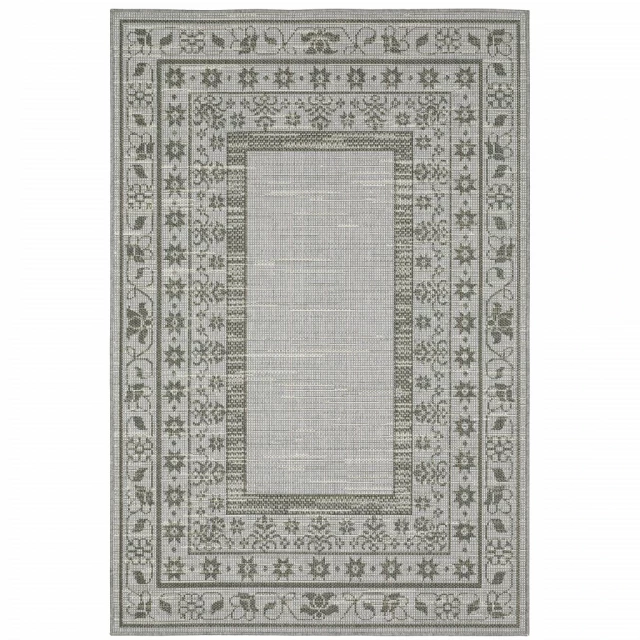 stain resistant indoor outdoor area rug with beige pattern and symmetrical design