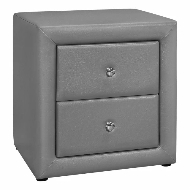 Gray faux leather nightstand with metal handles and multiple drawers