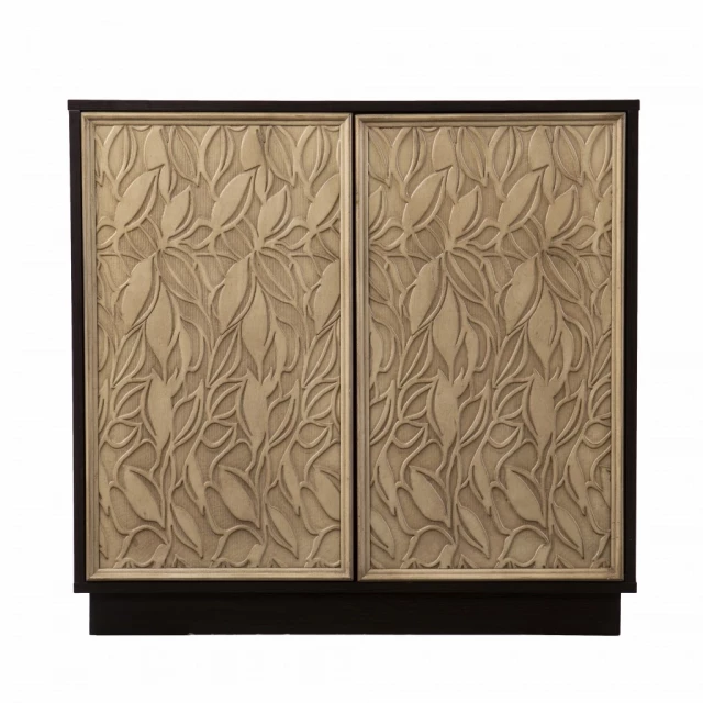 Cream sculptural leaf accent storage cabinet in brown wood with metal details and pattern art