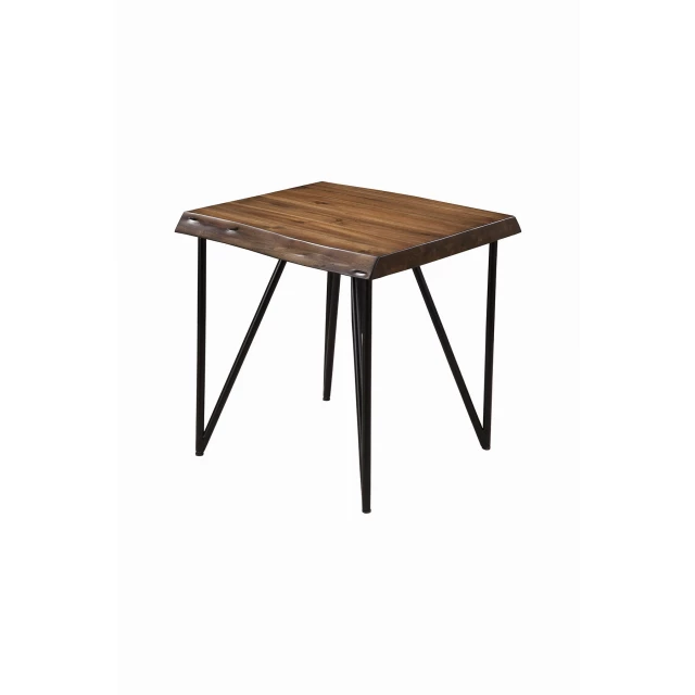 Solid wood brown end table in furniture setting with chairs and outdoor backdrop