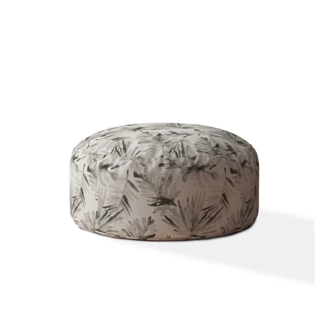 Beige flax round floral pouf ottoman in natural material with metal accents