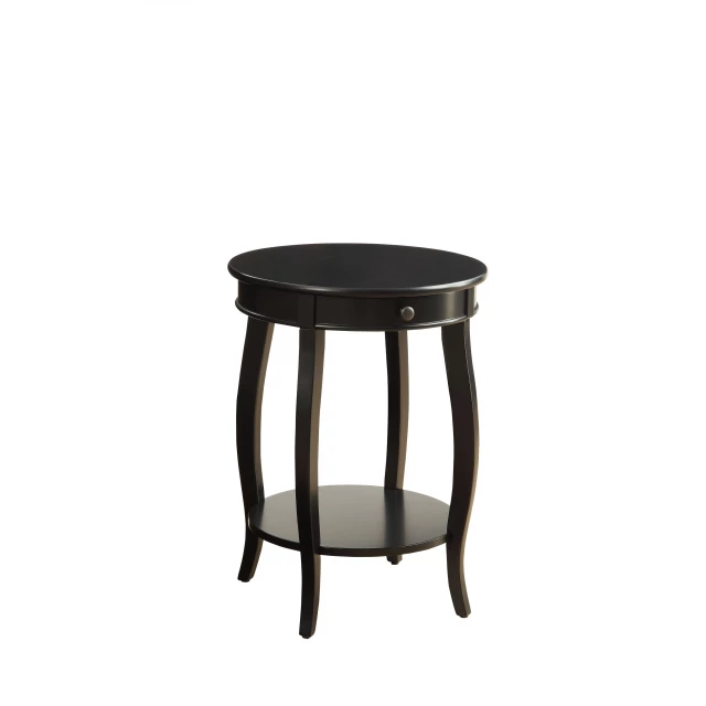 Solid wood round end table with shelf amidst furniture and plants