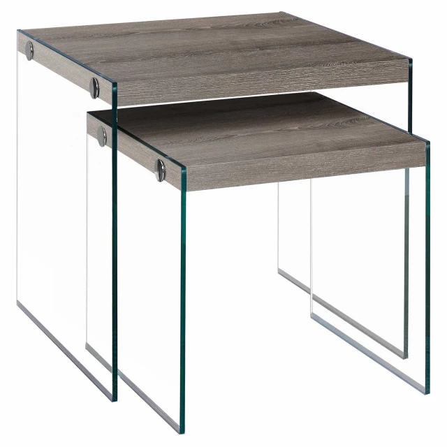 Particle board tempered glass nesting table with wood and plywood details in outdoor setting