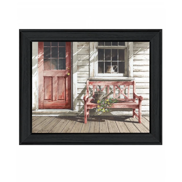 Black framed print of flowers as wall art in a stylish interior with window and wood elements