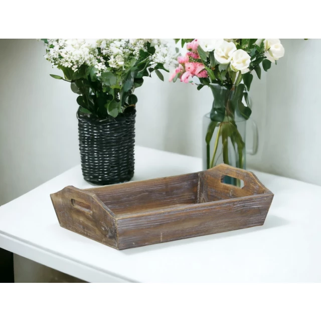 brown finish wood serving tray with handles and flowers on table