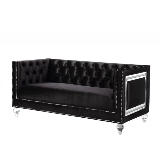 Black silver velvet loveseat with toss pillows for comfortable indoor seating