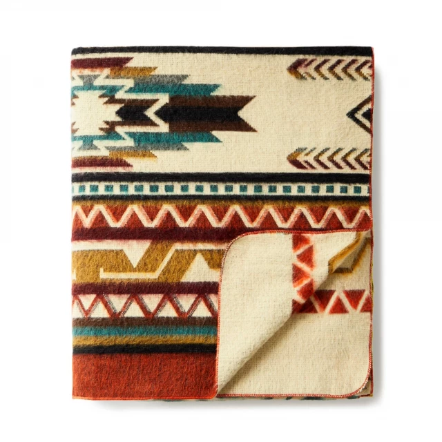 Soft southwestern arrow handmade woven blanket in brown and beige textile with creative arts pattern