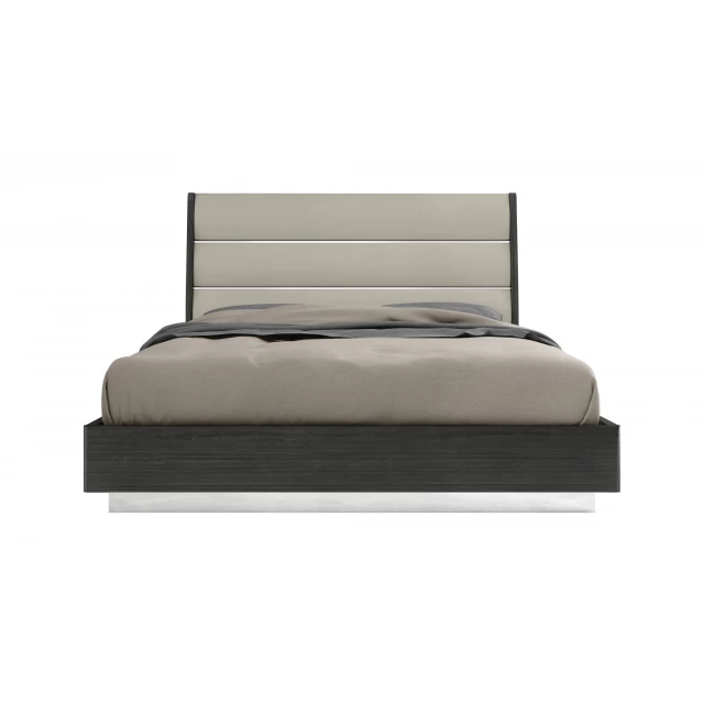 gloss bed frame with faux leather headboard in modern bedroom setting