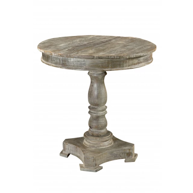 Solid wood round bistro dining table with pedestal base and serveware on top