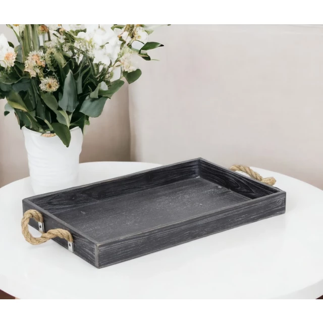 black aluminum indoor outdoor tray with handles and flowerpot on table