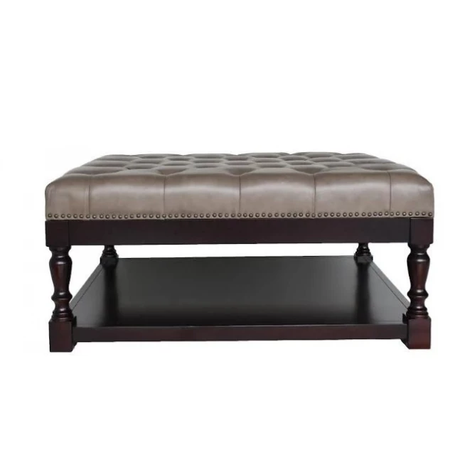 Leather solid wood coffee table with shelf and metal accents in furniture setting