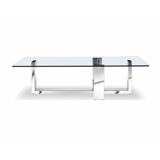Clear glass coffee table with wood chairs in outdoor setting