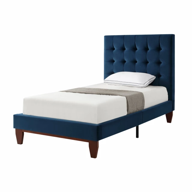 Wood twin tufted upholstered velvet bed in elegant bedroom setting