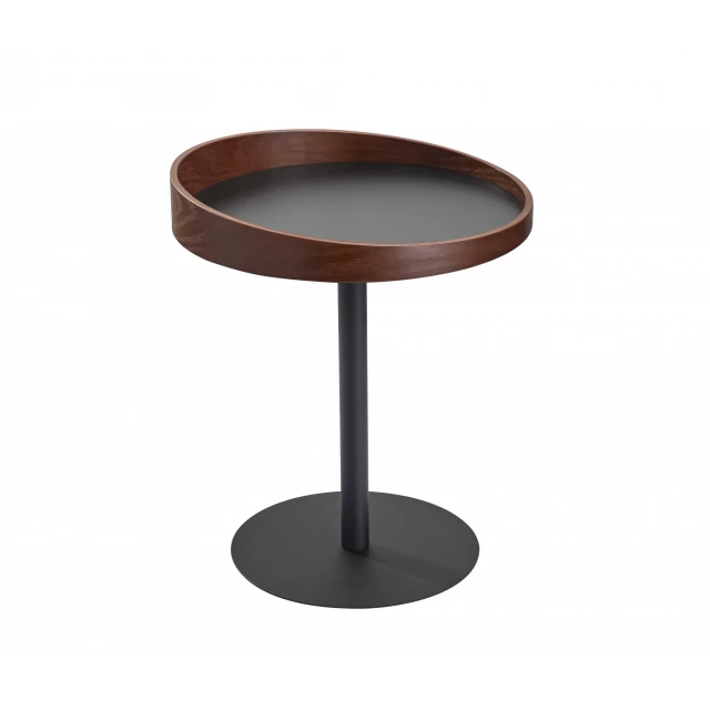 Black end table with wood finish and circular design elements possibly including clock and audio equipment accessories