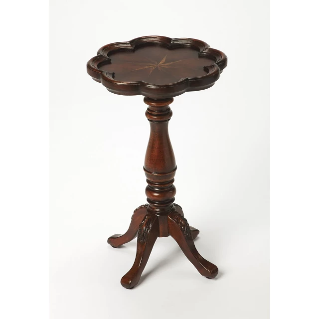 Brown cherry wood floral end table with glass drinkware and table lamp