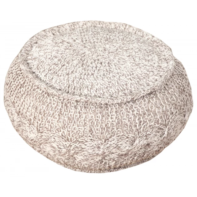 Beige cotton ottoman in a cozy room setting with wooden elements