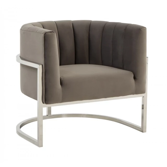 Steel channel tufted velvet accent chair with armrests and wood details