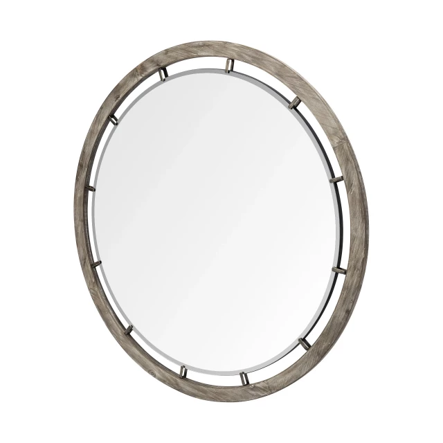 Round brown wood frame wall mirror as a fashionable home accessory with a hint of metallic titanium finish
