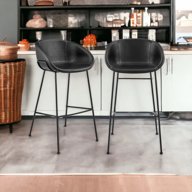 Low back bar height bar chairs with wooden flooring and interior design elements