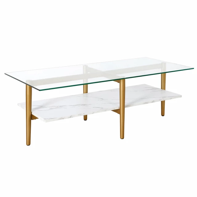 Gold glass steel coffee table with shelf in a natural outdoor setting