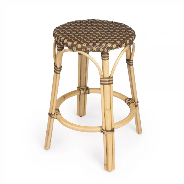 Brown rattan backless bar chair with wood stain and metal accents in outdoor furniture setting