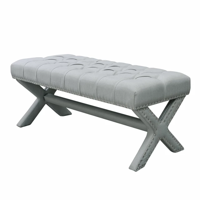 Light gray upholstered linen bench with wood and metal details suitable for outdoor use