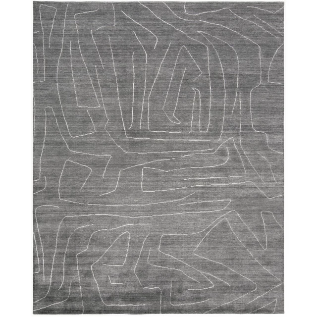 ivory abstract hand woven area rug with plant and monochrome photography design
