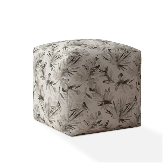 Beige flax floral pouf cover with patterned design and cylindrical shape for home decor