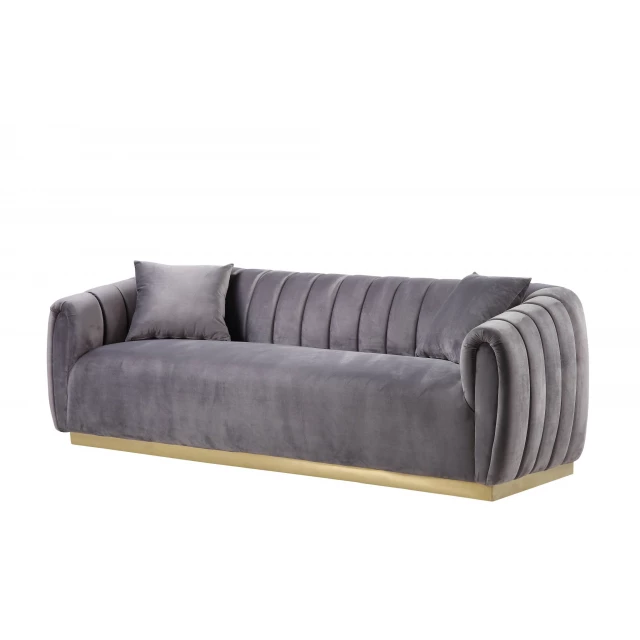 Gray velvet gold sofa with toss pillows and comfortable brown rectangle studio couch design