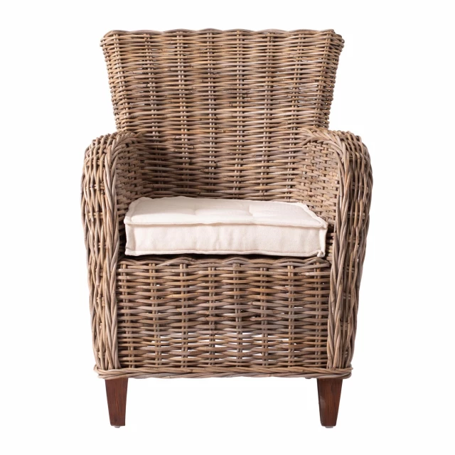 Natural brown cotton wingback dining chairs with wood armrests and wicker details