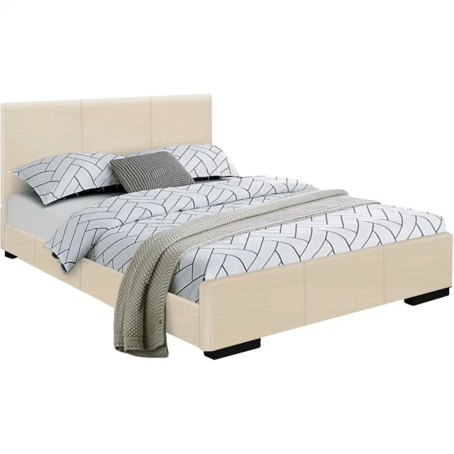 beige platform king bed in a minimalist bedroom setting