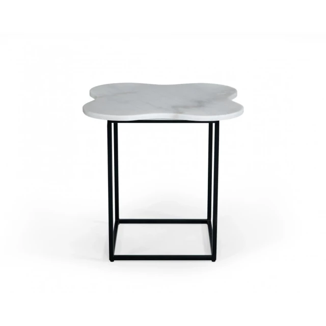 Black white marble form end table with glass and transparent materials in furniture design