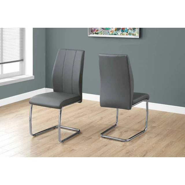 Chrome metal foam dining chairs with wood flooring and window blinds in stylish interior design