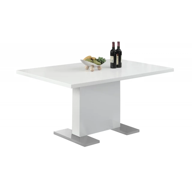 Rectangular solid wood metal dining table with bottles and plant on shelving