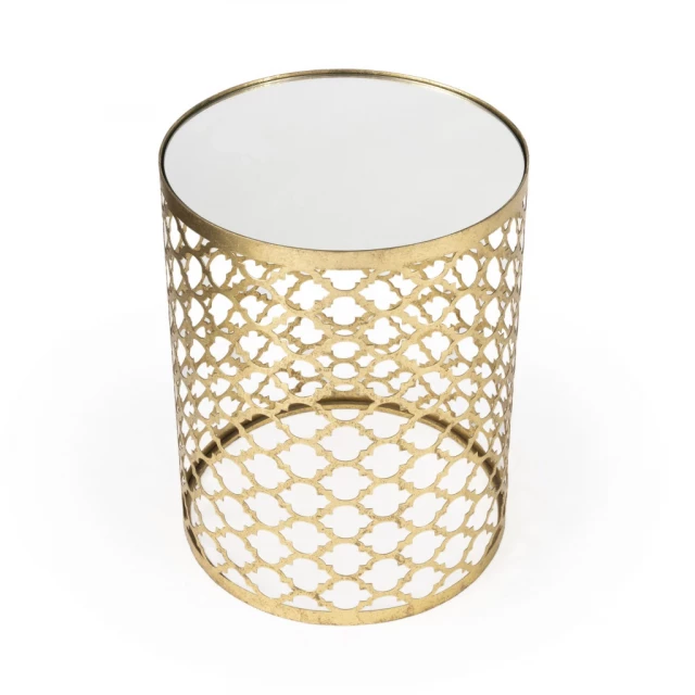 Gold mirrored round end table with artistic wood design and drinkware accessory