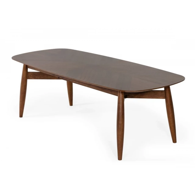 rounded rectangular solid wood dining table with tableware on top