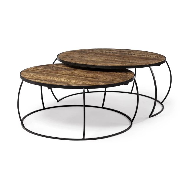 Round wood nesting coffee tables with metal accents in a home setting