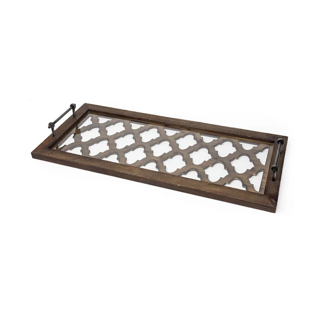 metal quatrefoil pattern glass bottom tray on wooden table