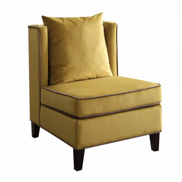 Dark yellow velvet accent chair with piping and wooden armrests