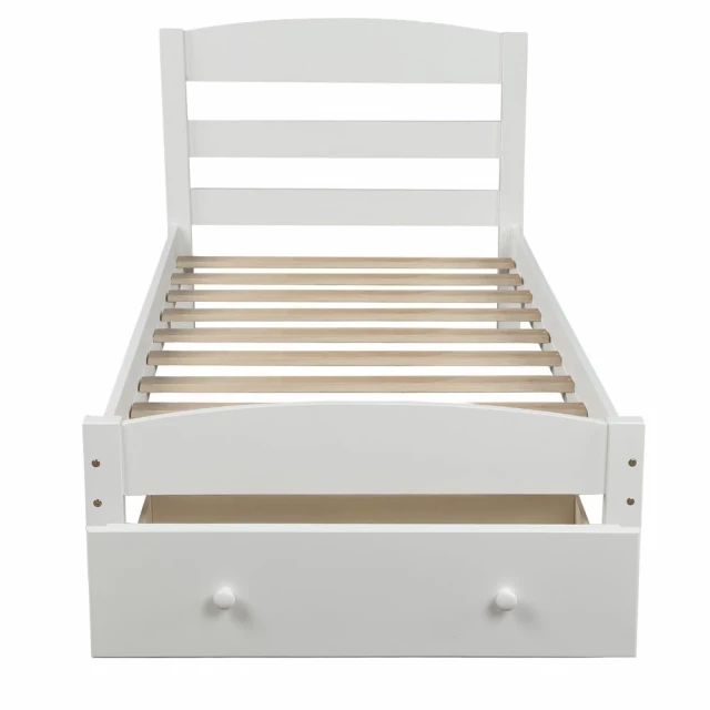 twin white upholstered bed in a clean modern bedroom setting
