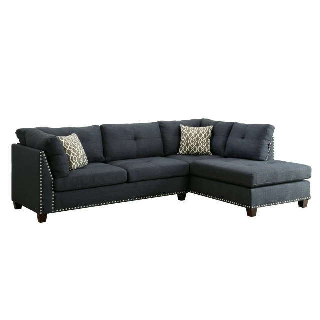 Blue linen L-shaped sofa chaise with pillows for comfortable seating in a modern home setting