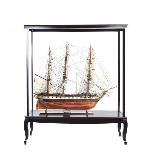 Dark brown glass display stand resembling naval architecture with wood accents