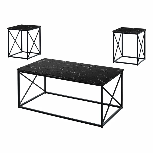 Black metal coffee table with wood accents and outdoor furniture setting including chairs and plant
