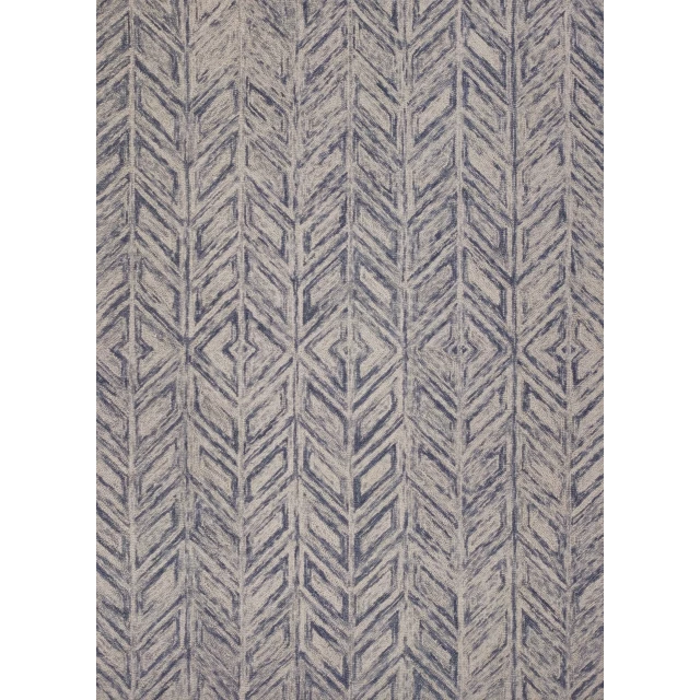 hand tufted herringbone indoor area rug in brown purple and grey on wood flooring