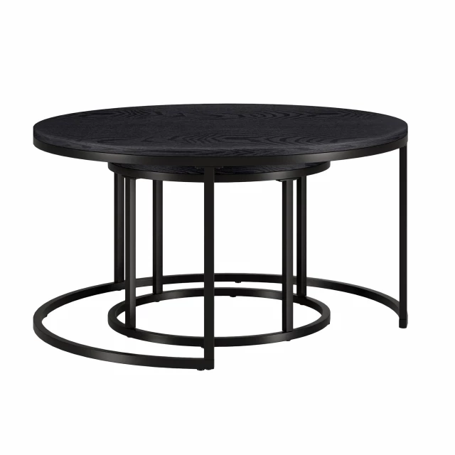 Black steel round nested coffee tables in an outdoor setting