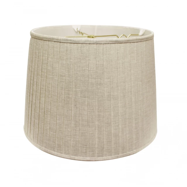 Cream paperback linen lampshade with side pleats on wooden chair