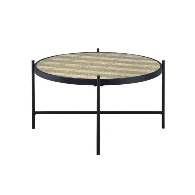 Glass manufactured wood round coffee table with chairs in outdoor setting