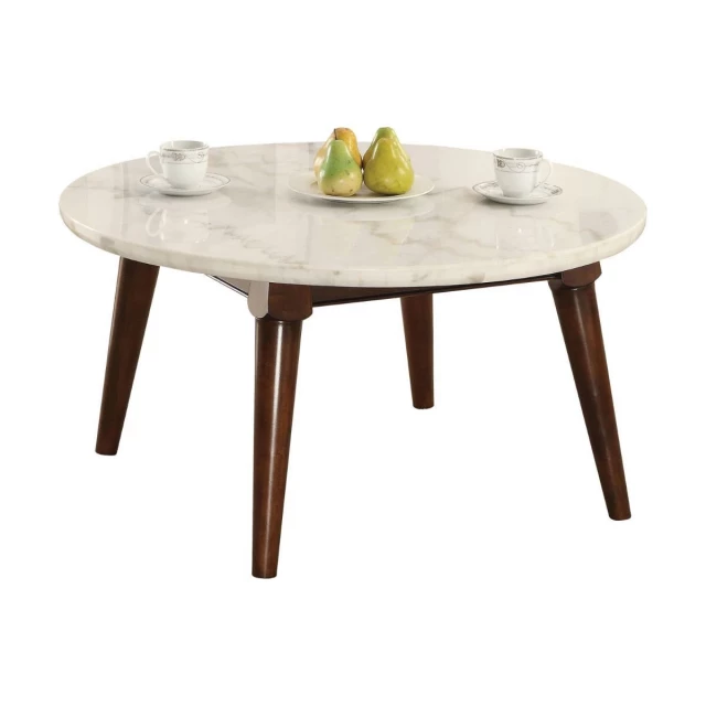 Marble faux marble round coffee table in a modern furniture setting
