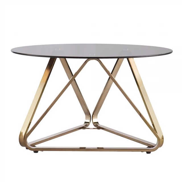 Champagne glass metal round coffee table in a modern outdoor furniture setting